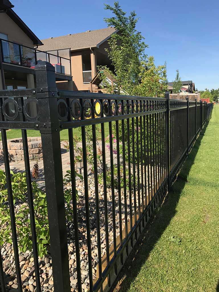 wrought iron fencing, custom fencing, concrete fencing